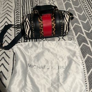 Michael Kors animal print purse with matching wallet